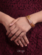 TM10043 - Golden Tone Stone Bangle 2-Zilmor