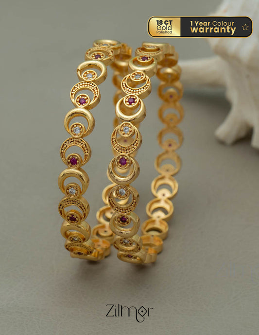 TR10044 - Golden Tone Bangle (Pair) 1-Zilmor