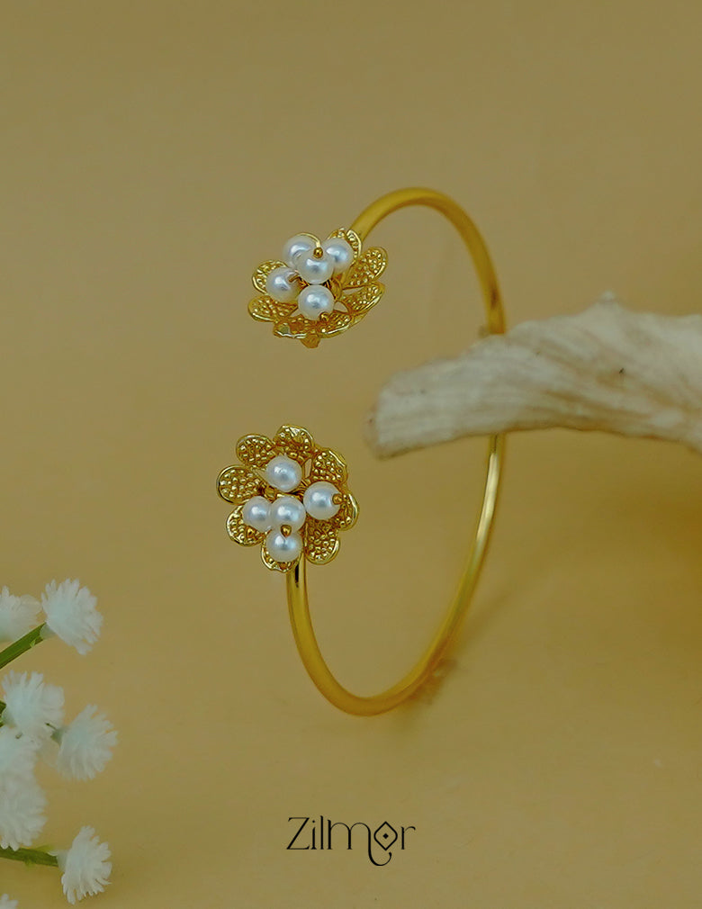 Adjustable pearl cluster bangle with gold-tone floral design for women