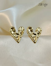 Trendy contemporary golden heart shaped stud earrings with anti-tarnish coating for women