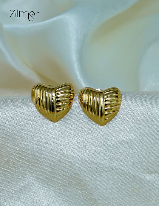 A pair of trendy contemporary golden heart-shaped stud earrings with a shiny anti-tarnish finish