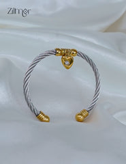 Adjustable heart shaped cubic zirconia twisted wire bracelet bangle