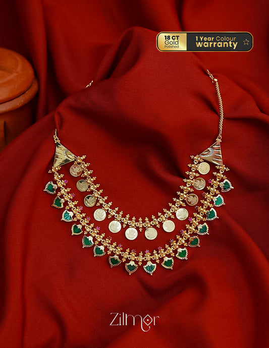 Multi-layer gold tone bridal choker necklace with Lakshmi coin and leaf design.