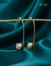 Trendy contemporary pearl golden stud earrings with anti-tarnish coating for women