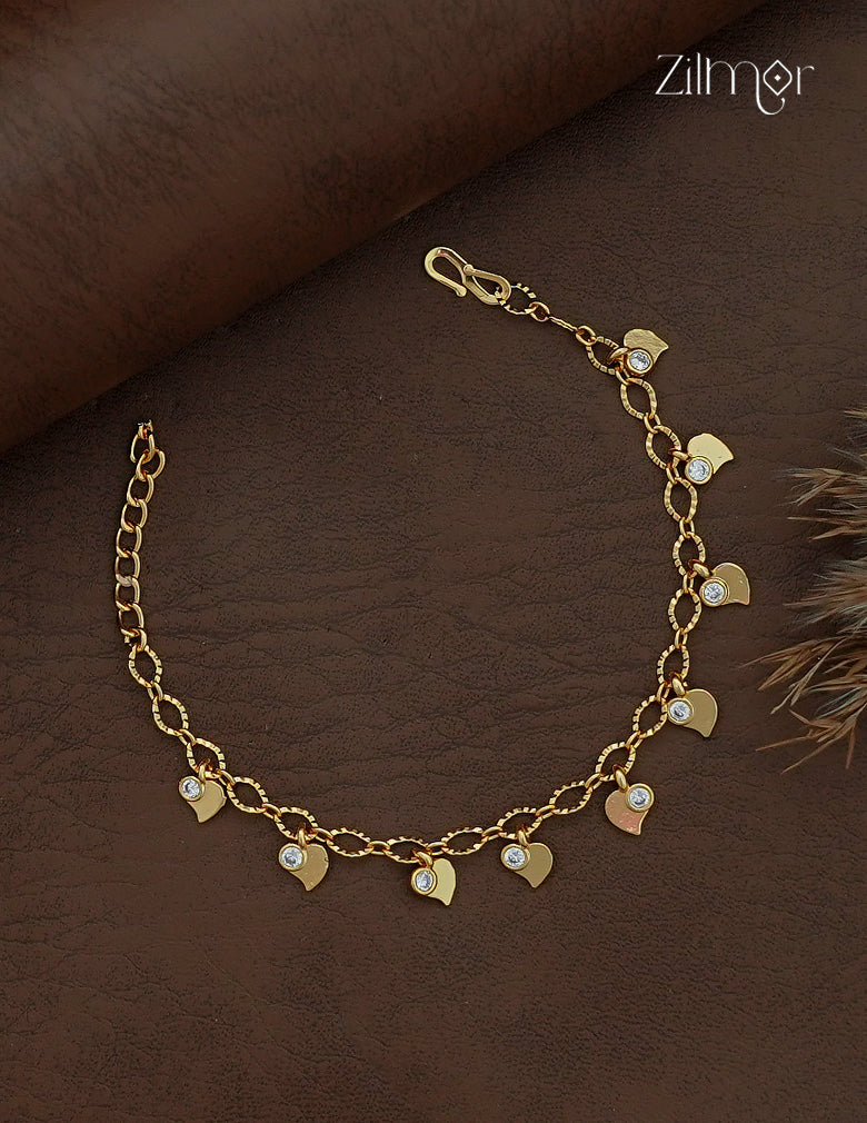 Zilmor 18K gold plated AD stone heart charm chain bracelet with textured oval links and an extension chain.