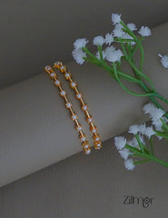 SG1011970 - Gold Plated Pearl Bangle (pair)