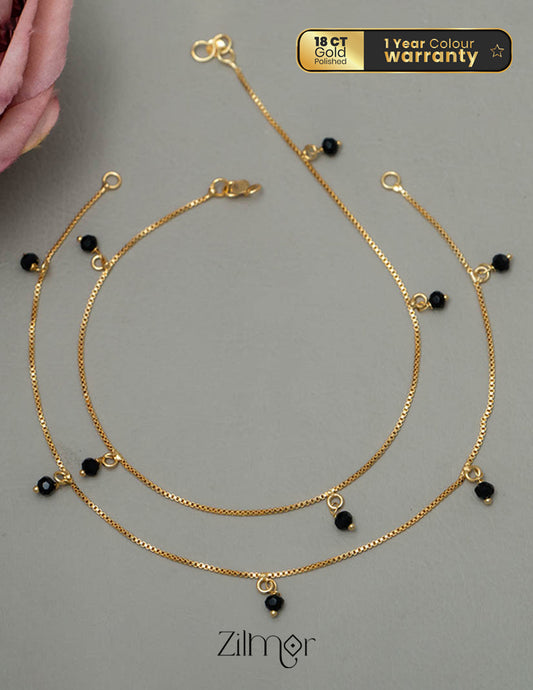 TR101788 - Gold Toned Black beaded pair Anklet