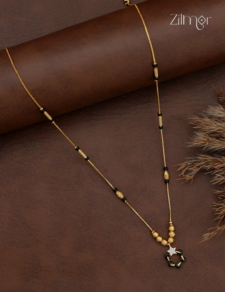 18K gold plated simple mangalsutra necklace with spaced black beads and dark pendant with AD stone accent