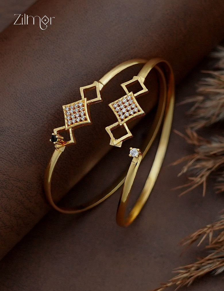 18K Gold Plated Geometric Openable Bangle - black onyx variant worn on wrist with 18CT gold polish badge