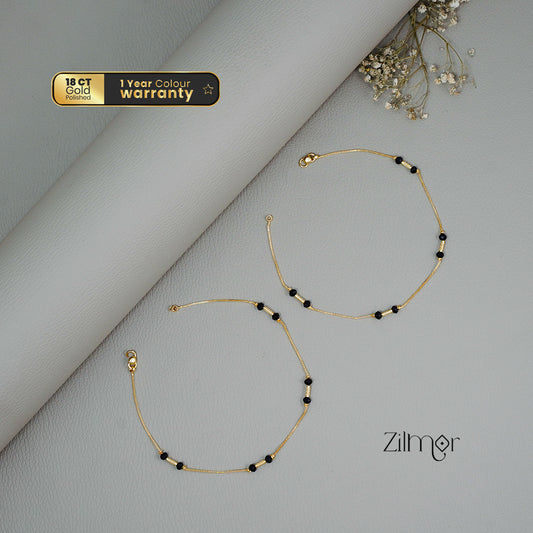 KT1011130 - Gold Toned Black beaded pair Anklet