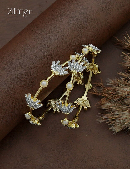 Gold AD Stone Lotus with Pearl Bangle Pair – side profile on wrist showing lotus and pearl detailing