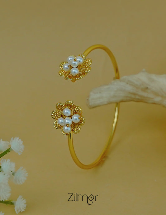 Adjustable pearl cluster bangle with gold-tone floral design for women