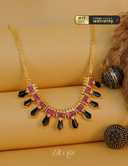 Bridal jewelry necklace with ad stones and traditional Nagapadam pendant.
