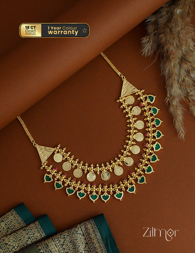 Close-up of the auspicious Goddess Lakshmi coin pendant and intricate Palakka motifs.