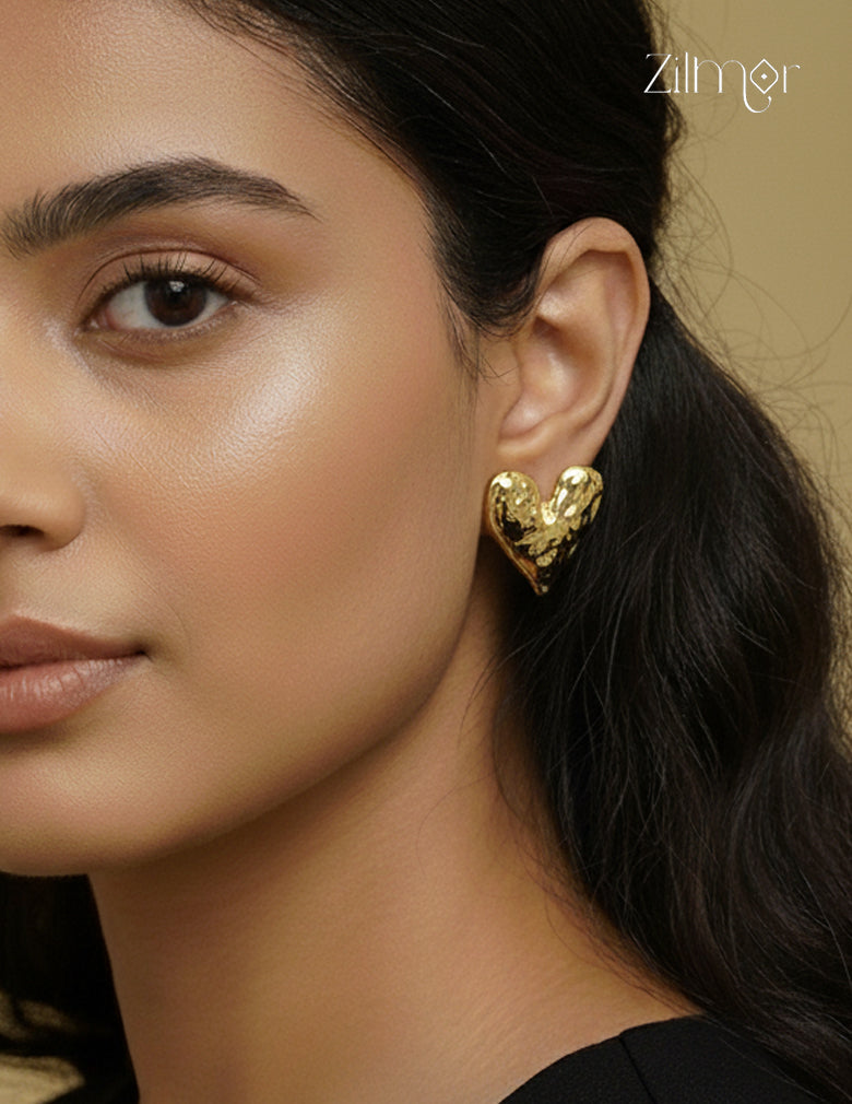 Contemporary style golden heart shaped stud earrings